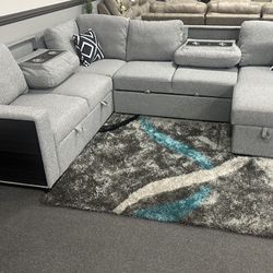 Grey couch with storage