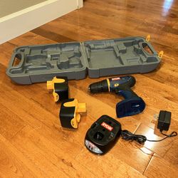 Ryobi HP412 drill with 2 batteries and a case