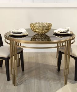 Drakeford Round Glass Top Metal Base Dining Table