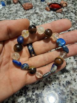 Crystal healing bracelet, custom design, mixed bead Citrine, lapis lazuli, and tigers eye.