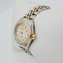 Ladies Rolex 26mm DateJust Two Tone 18K Gold / Stainless Steel Watch with Beige Diamond Dial and Diamond Bezel. (Pre-Owned 69173)