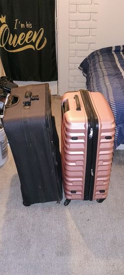 Bolso de mano para traje de American Tourister de piel sintética marrón. Y maleta negra marca PALM SPRINGS RICARDO BEVERLY HILLS DE 32X21 maleta de ma