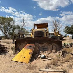 Caterpillar d8 dozer with front blade and back shanks 