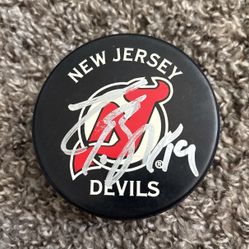 Travis Zajac signed hockey puck