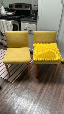 Two yellow chairs pillow included
