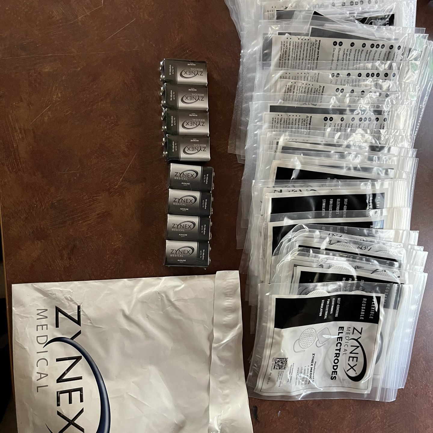 ZYNEX Medical NexWave Tens Machine Supplies 30/Electrodes 8/9V Batteries  New !!