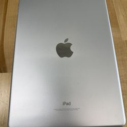 Unlocked iPad 6th Gen 32GB Gold - Cracked but works great.  