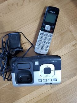 Box Of Binders And Home Phone