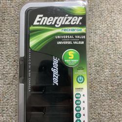 Charges your batteries. Never used. 25$