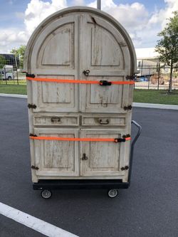 Extremely rare custom-made distressed wood armoire. One of a kind not another like it anywhere in the entire country