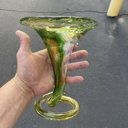 vintage hand-blown art glass vase featuring a distinctive green and brown swirl pattern, often referred to as a "swung" or "stretch" vase with a coil 