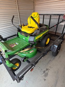 All 4 items for a great price!! John Deere zero turn, push motor, edge cutters & weed eater