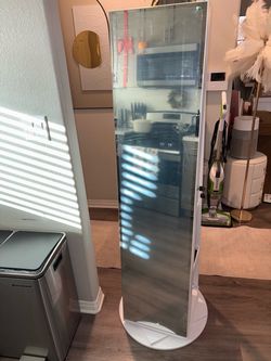 360 rotating jewelery cabinet with full length mirror