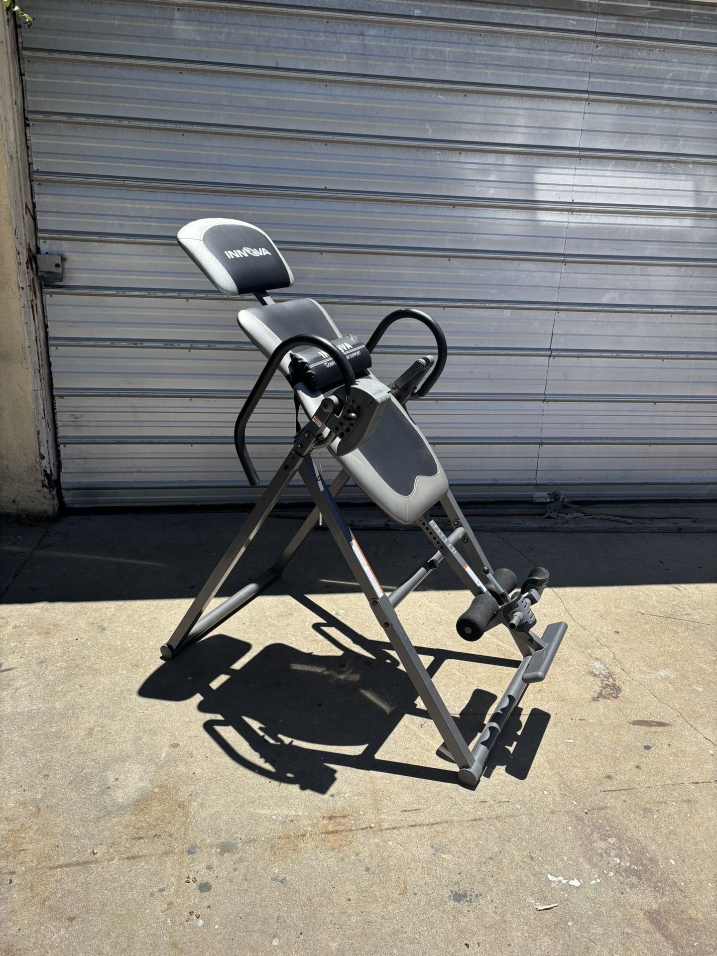 Innova Inversion Table with Adjustable Headrest, Reversible Ankle Holders, and 300 lb Weight Capacity Innova Inversion Table with Adjustable Headrest
