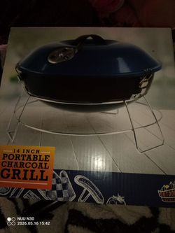 Portable charcoal grill