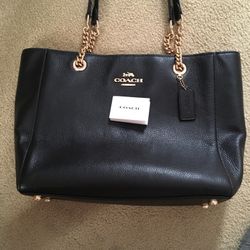 Gorgeous black With gold chains Coach Coach