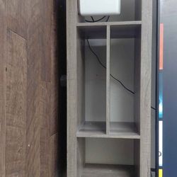 grey driftwood-finished television console