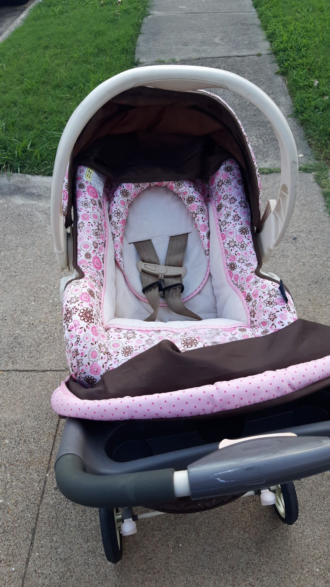 Stroller with baby carrier and base