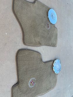 Cadillac floor matts  and center caps