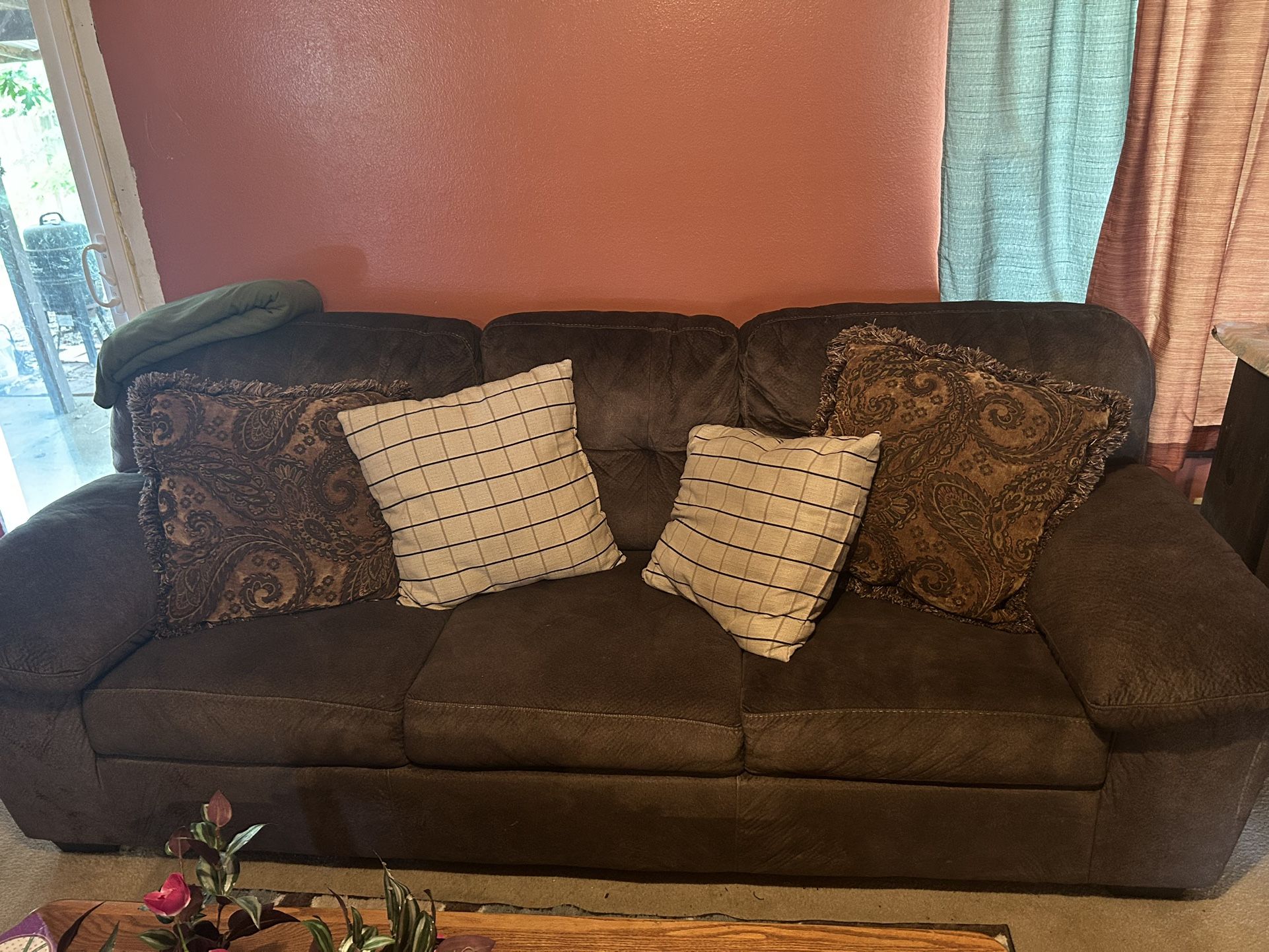 Nice Long Sofa With Pullout Bed Pillows Included