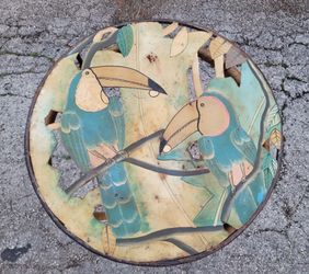 Cute bistro table with toucan jungle scene