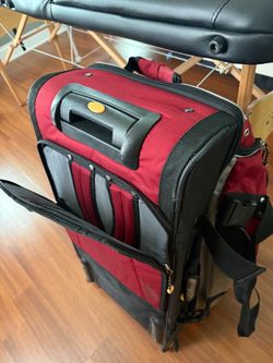 Samsonite large rolling duffel suitcase with backpack straps