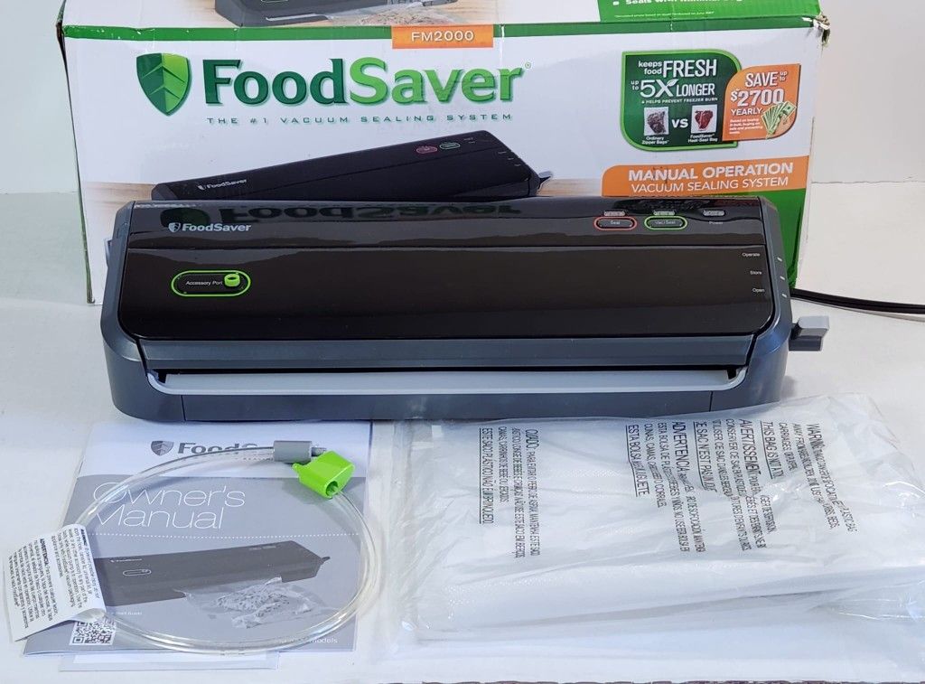 FoodSaver Vacuum Sealer Machine with Starter Vacuum Seal Bags & Rolls, Safety Certified, Black #417
