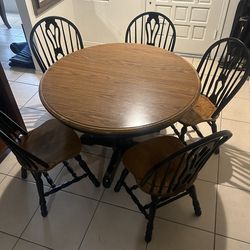 Table, 5 chairs and 2 table leafs