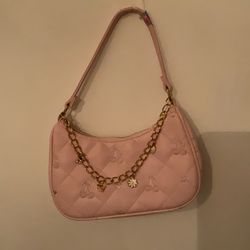 Pink purse with charms