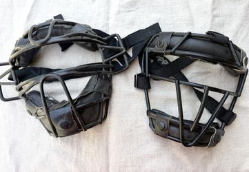 Two Baseball Catcher's Masks