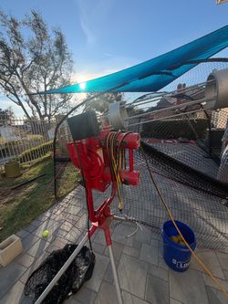 Heater 75 pitching machine & cage