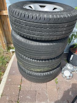 4 Toyota tires and rims 245-75- R16