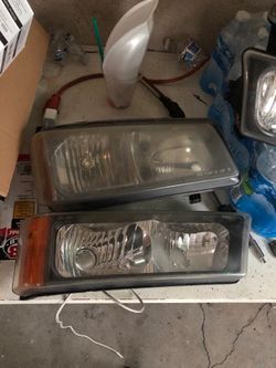 06 chevy silveradoOEM head lights