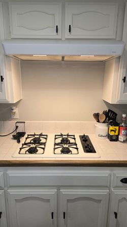 Nutone 36" range hood and 30" drop in gas stovetop