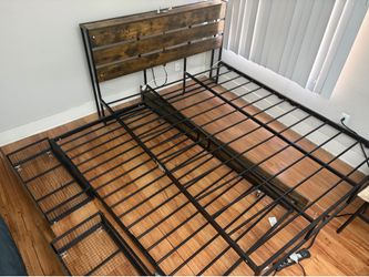 Queen size bed frame with pull out frame for single bed and storage