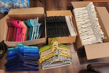 240 various plastic tubular and standard clothing hangers, great condition