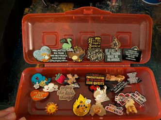 Assorted enamel pins