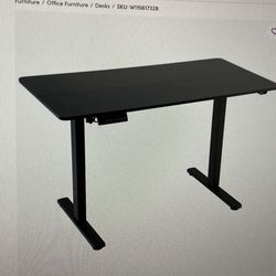 Used electric standing table
