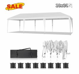 #F  10’ × 30’ Pop-Up Canopy Tent Color: White Waterproof • Instant Setup • Portable Outdoor Gazebo Includes Carrying Bag & 8 Sandbags Great for Weddin