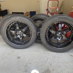 22 And A Half Inch Black 6 Lug Rims With Tires