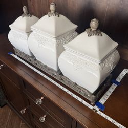Set Of 3 Ceramic Jars In A Metal Base 