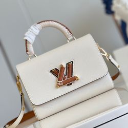 Twist Handbag by Louis Vuitton Bag