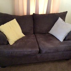 Love Seat With Two Pillows