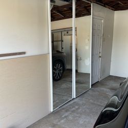 Large Mirrored Sliding Closet Doors Approximately 3’x8’