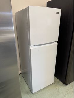 Refrigerator top bottom