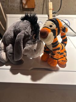 Tigger and Eeyore plush dolls