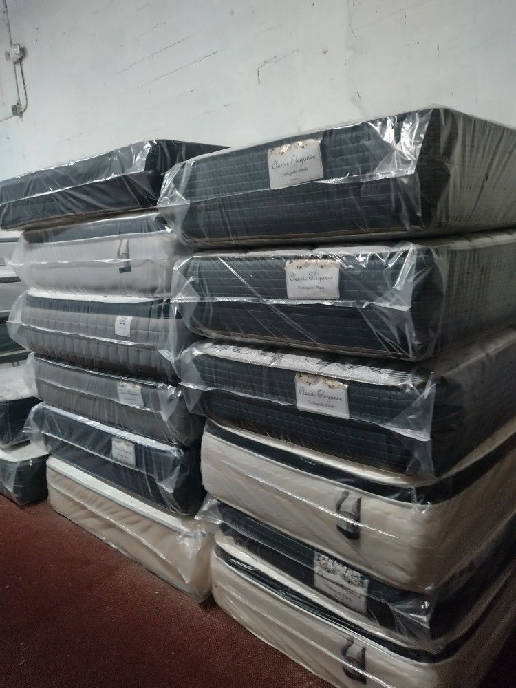 Stack of new mattresses wrapped in protective plastic. Multiple styles available.Tenemos todos los tamaños disponibles y entrega el mismo día cobramos,New Products : American Fashion Style Bags On Sale