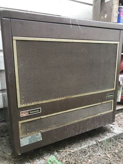 Vintage Cast Iron heater with Smoke Stack.