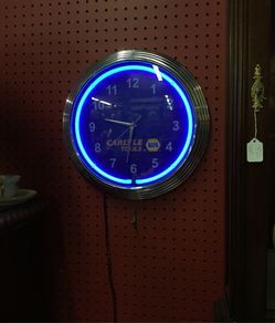 Napa store advertising clock neon