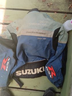 Suzuki Motorcycle Jacket & Helmet $75